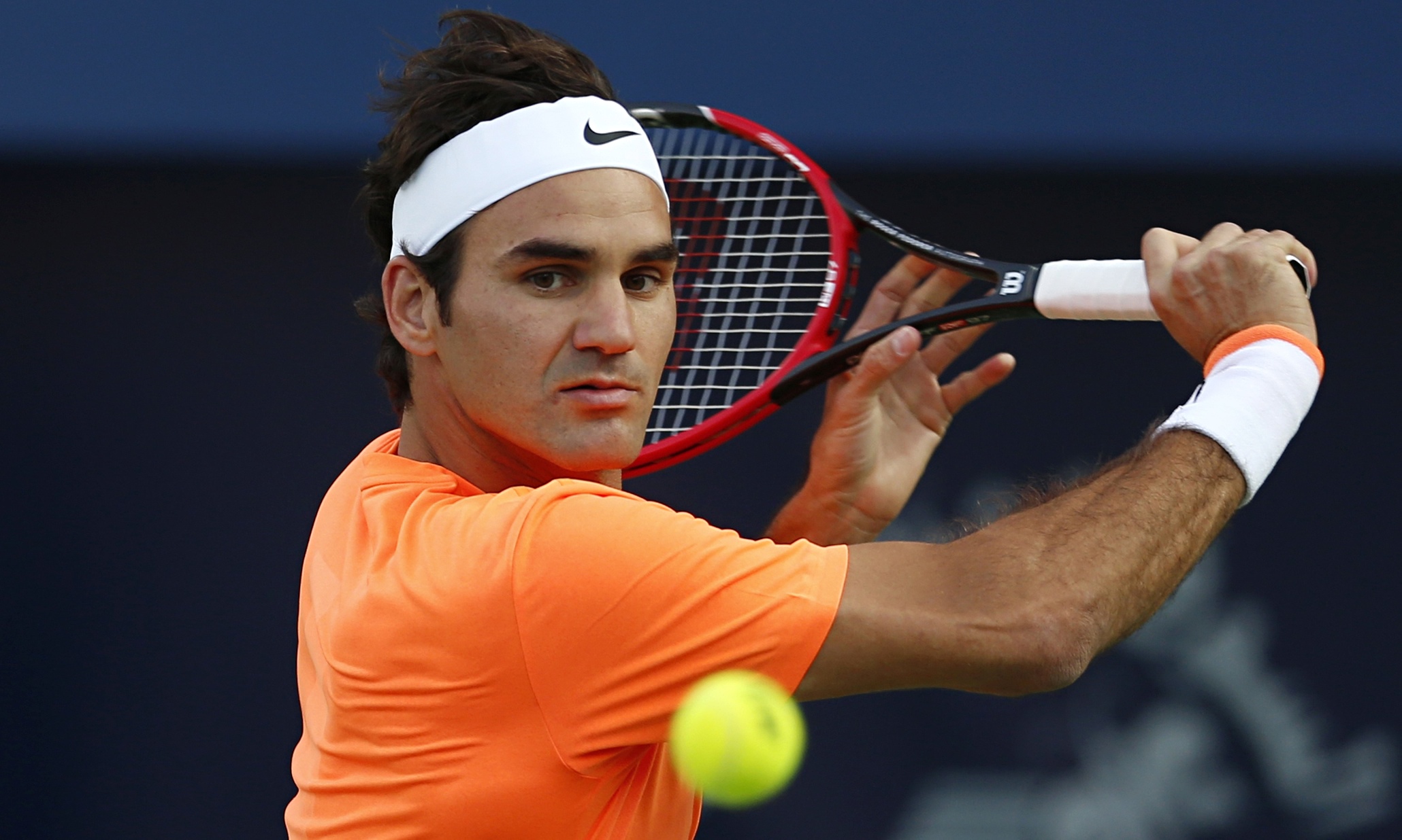 Roger Federer in action against Borna Coric