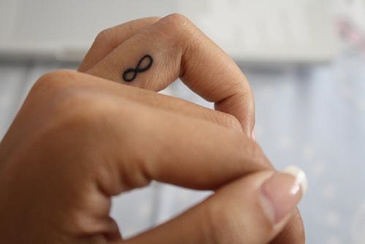 Tiny Infinity Tattoos On Fingers