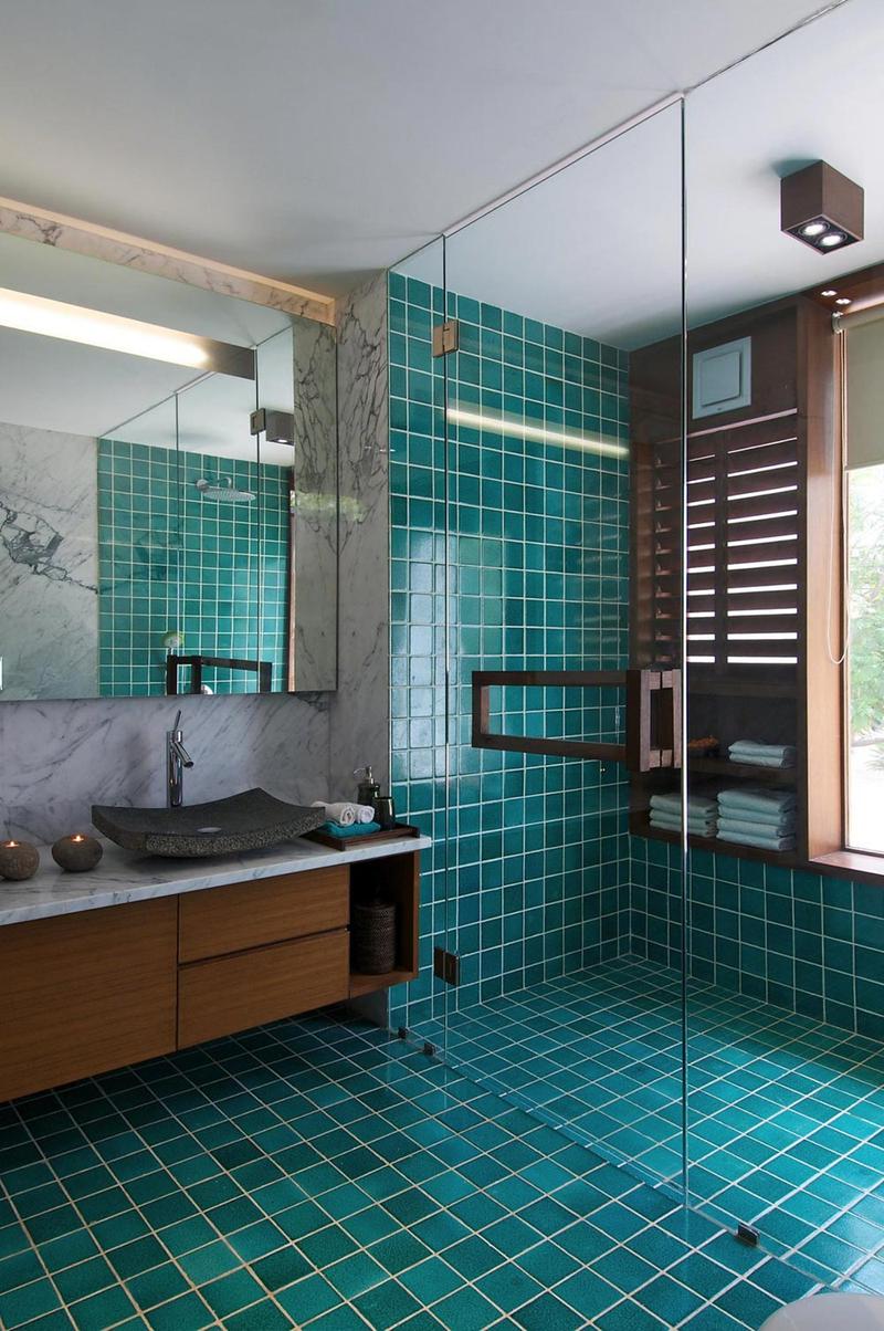blue-bathroom-with-spacious-glass-shower