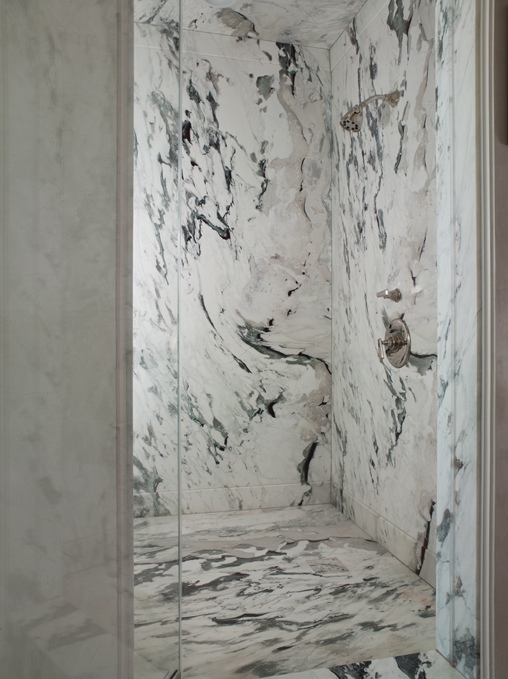 framless-walk-in-shower-with-marble-walls